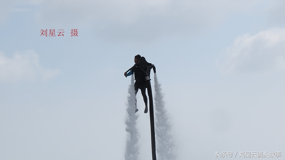 空中滑翔伞三亚,三亚大东海水上飞人