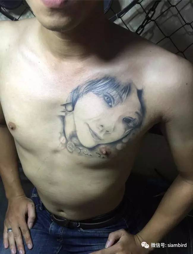 男子分手后把女友纹身改成魔鬼,男子分手把纹身女朋友改成骷髅头