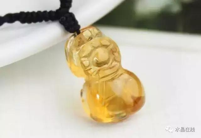 怎么判断黄水晶吊牌真假,如何辨别真假黄水晶能量柱