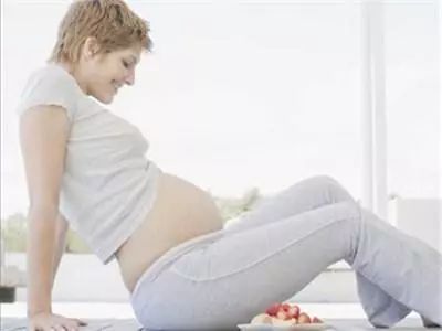 怀孕了坐着肚子是什么样子的,怀孕了应该怎么躺着