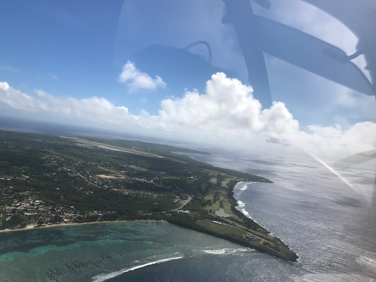 上午在广州捂白过严冬,下午在塞班岛放肆晒黑