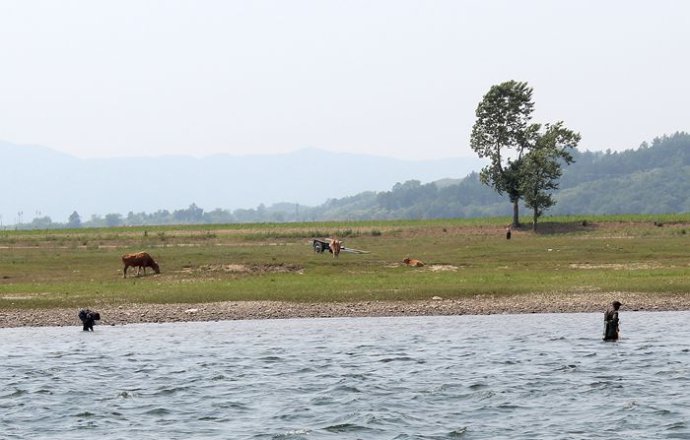 中朝边境美丽的风景,中朝边境桃花盛开的地方