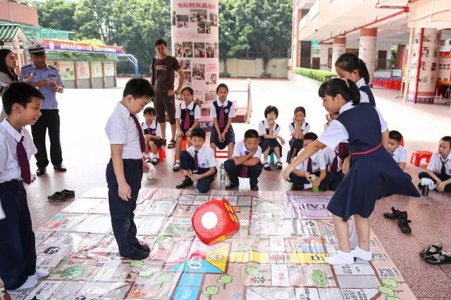 教育丨玩飞行棋学交通规则?西关培正小学户外安全课脑洞大开