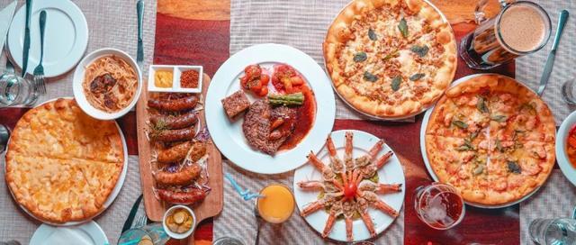 昆明这家开在76年前电影院的餐吧，手工披萨被写进国外旅游攻略