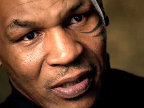 泰森脸上的纹身,拳王泰森身上纹的什么