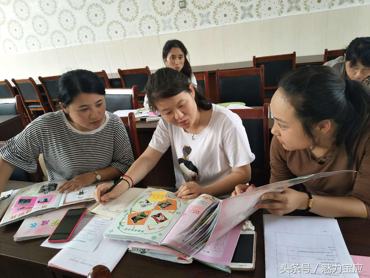 宝应曹甸镇中心幼儿园:成长手册展风采,共同成长促提高!