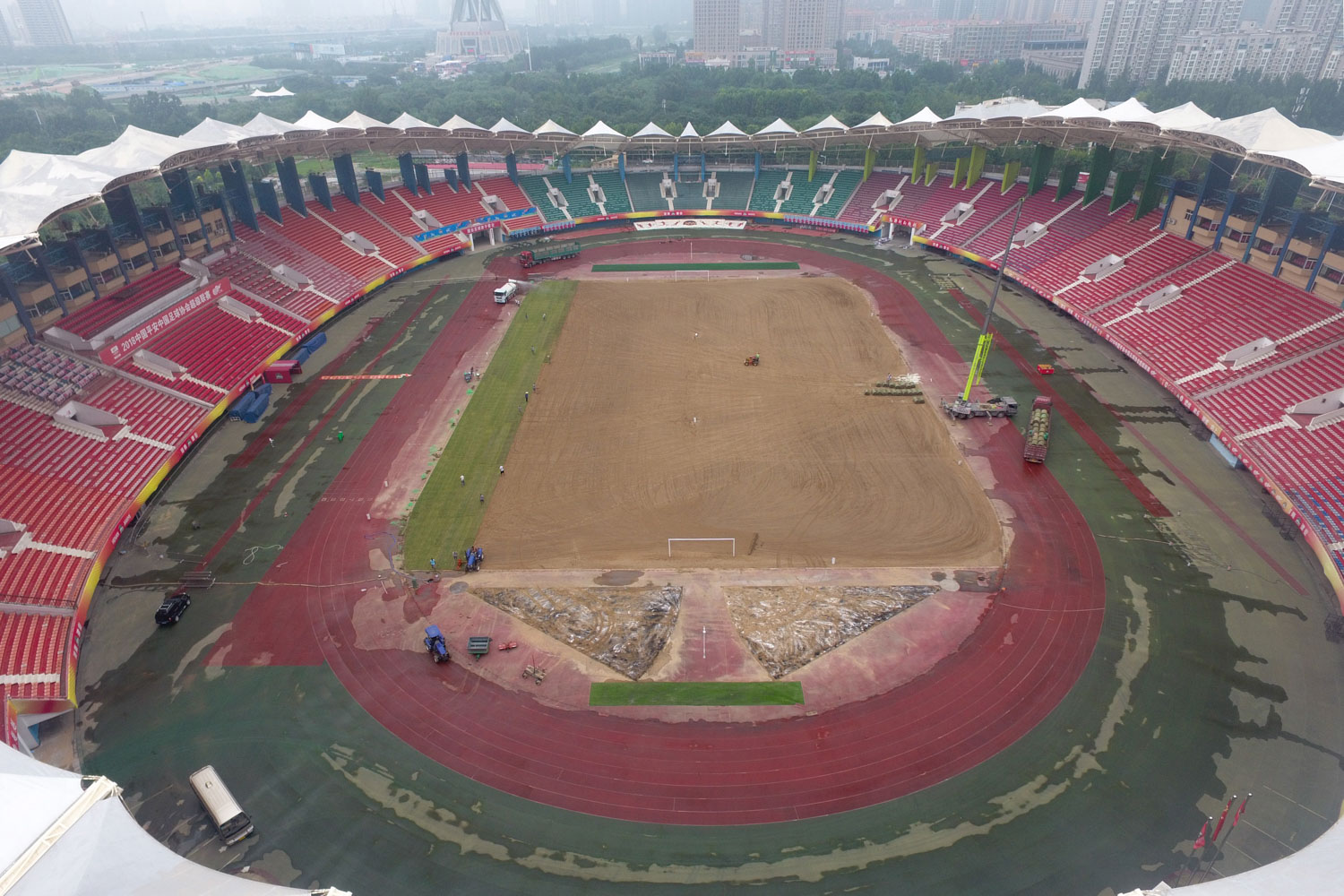 河南建业是不是换了草皮,河南建业草皮铺设