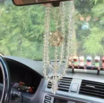 车内悬挂挂件违章吗,车主九个不知道汽车防静电扣