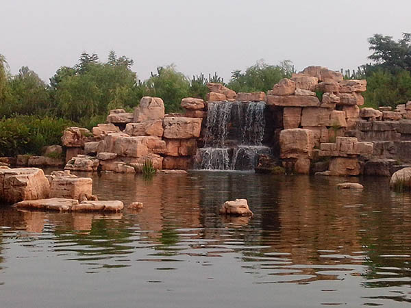 家里小假山怎么制作,如何自己在院子里做个小假山