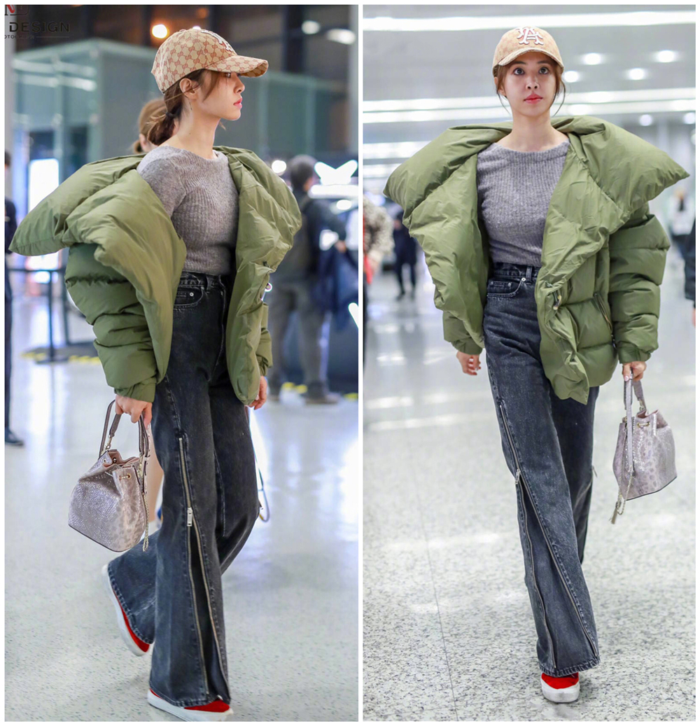 蔡依林冬日身穿露脐装,蔡依林很会穿搭蓝色羽绒服