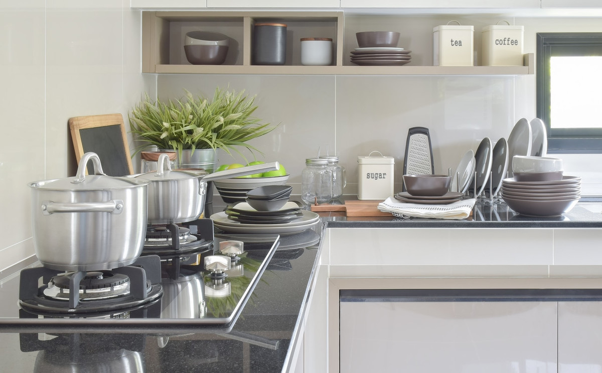 为啥不推荐不锈钢台面呢,用了几年的不锈钢