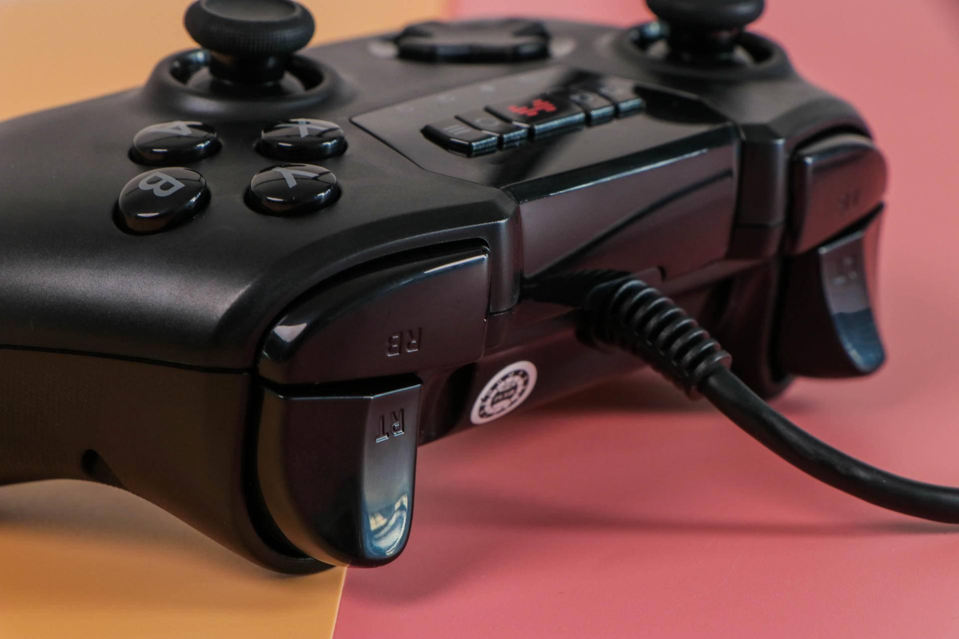 高性价比游戏手柄推荐2k,性价比高的游戏手柄雷神