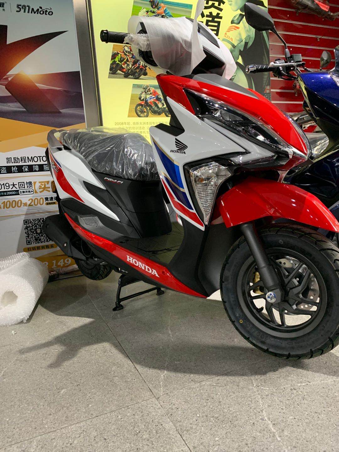 本田裂行125踏板有防盗报警功能吗,新大洲本田裂行125踏板评测