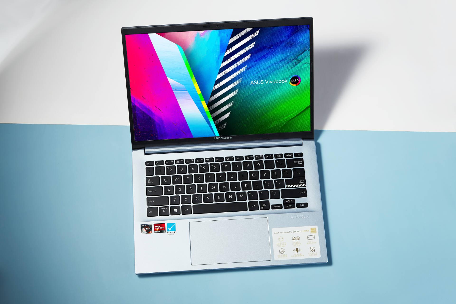 华硕无畏pro14值得买吗塑料感强吗,redmibookpro15和华硕无畏14对比