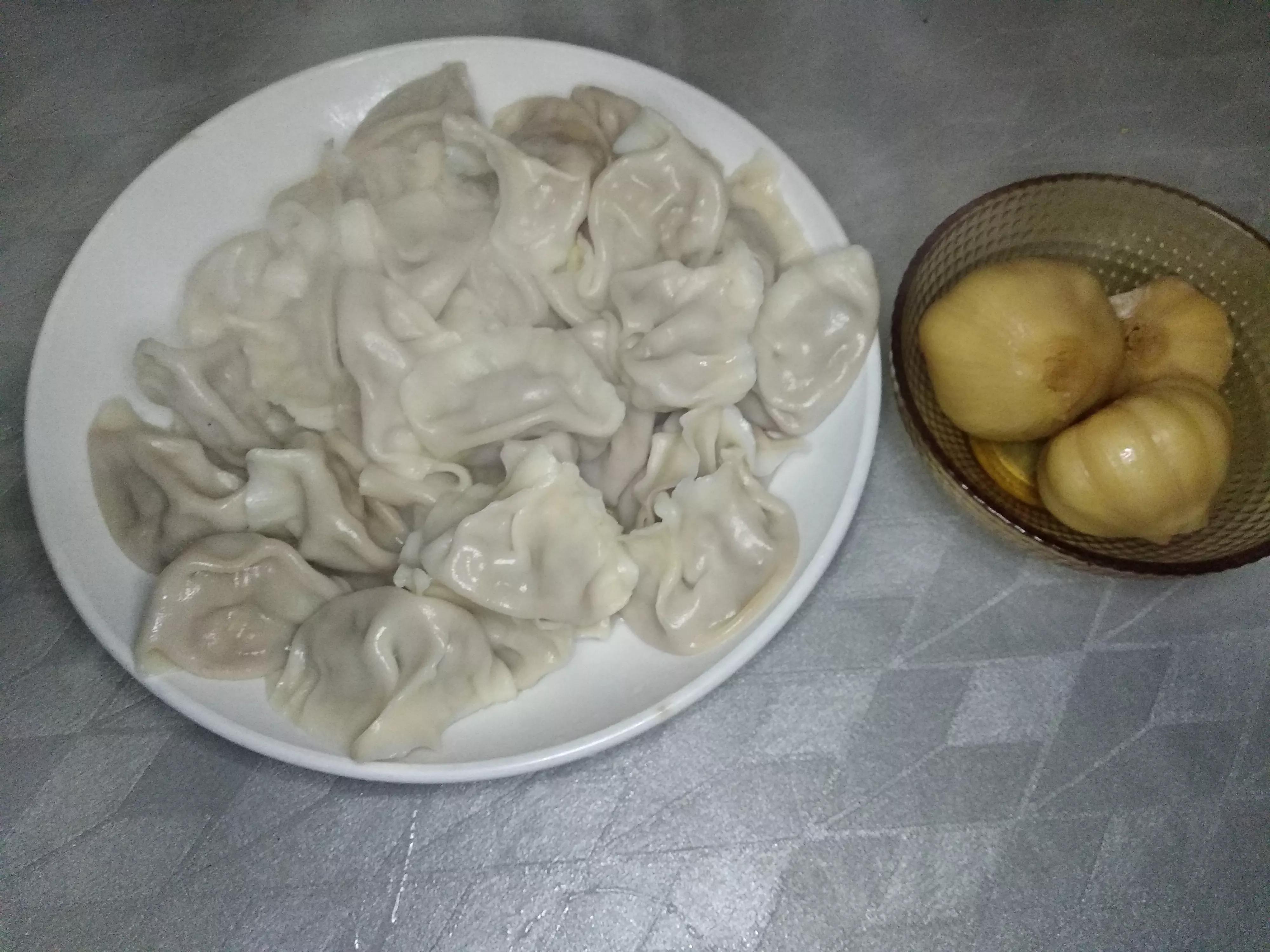 东北酸菜饺子怎么调馅好吃,正宗东北酸菜饺子的做法