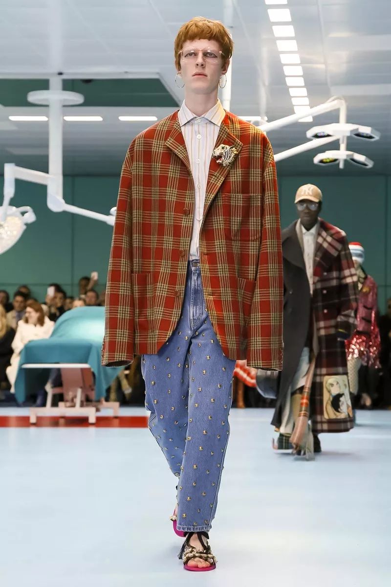 gucci设计理念是什么,gucci品牌标志性设计元素