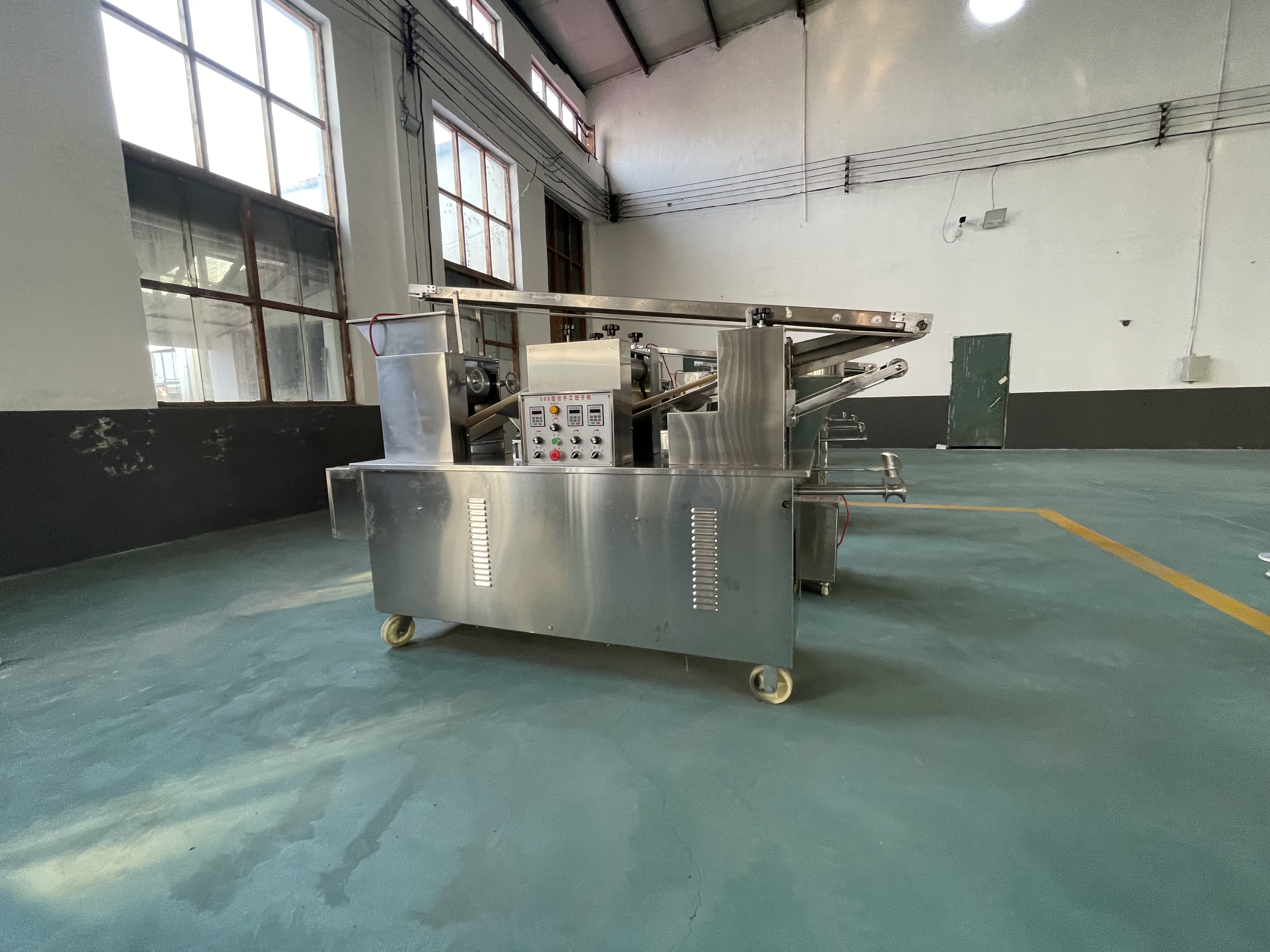 国宇机械全自动饺子机一台多少钱,小型全自动饺子机最便宜的多少钱