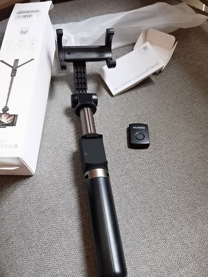 华为有线自拍杆的使用方法及操作,华为手机用自拍杆的使用方法图解