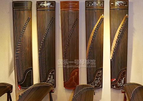 敦煌古筝大家闺秀怎么辨别真伪,假敦煌古筝和真的有什么区别