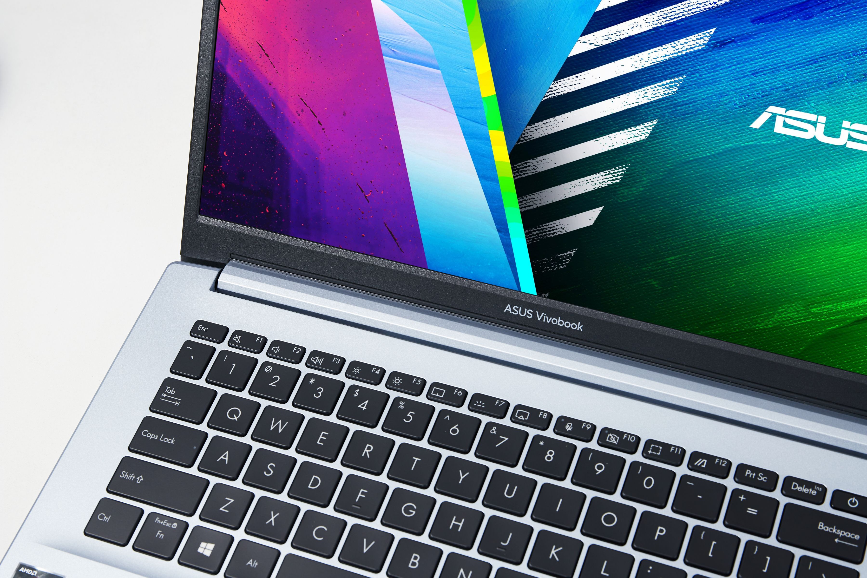 华硕无畏pro14值得买吗塑料感强吗,redmibookpro15和华硕无畏14对比