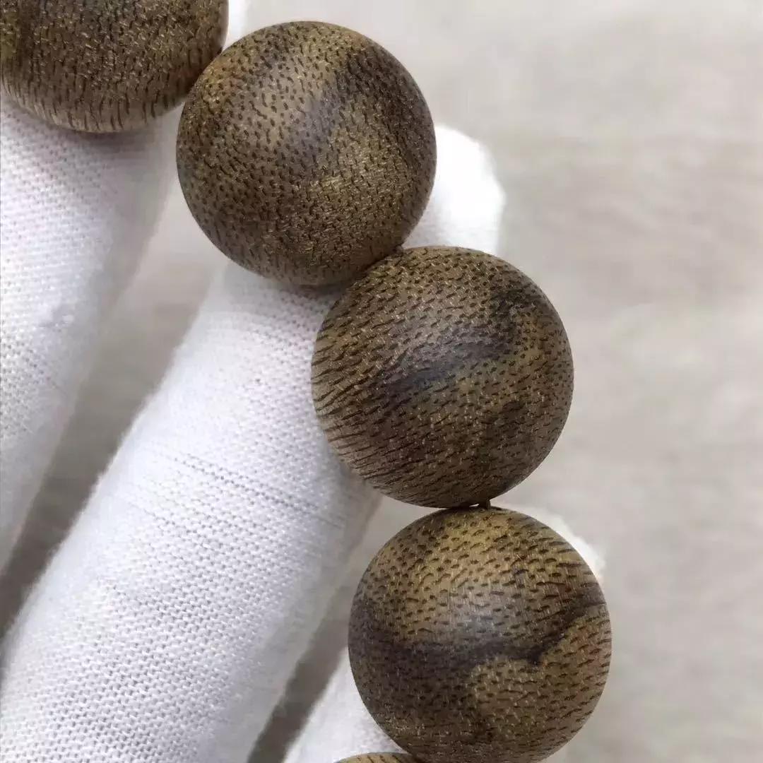 加里曼丹沉香手串啥样子,加里曼丹沉香108颗手串怎么配