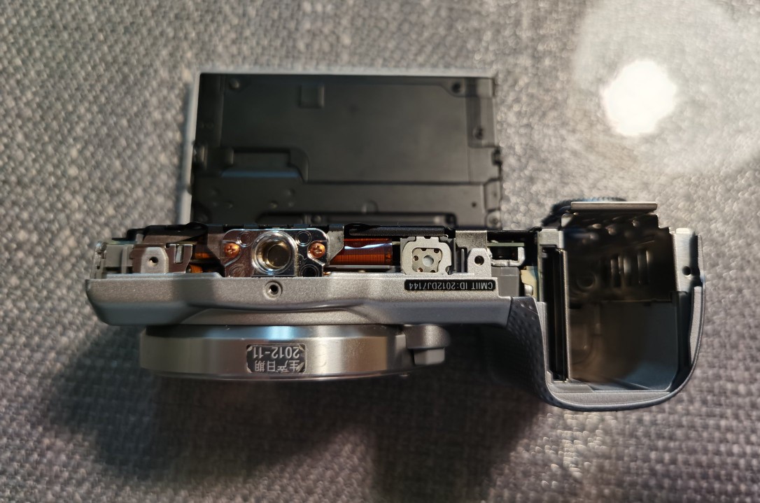 索尼相机更换快门组件,索尼微单相机电池盖拆卸教程