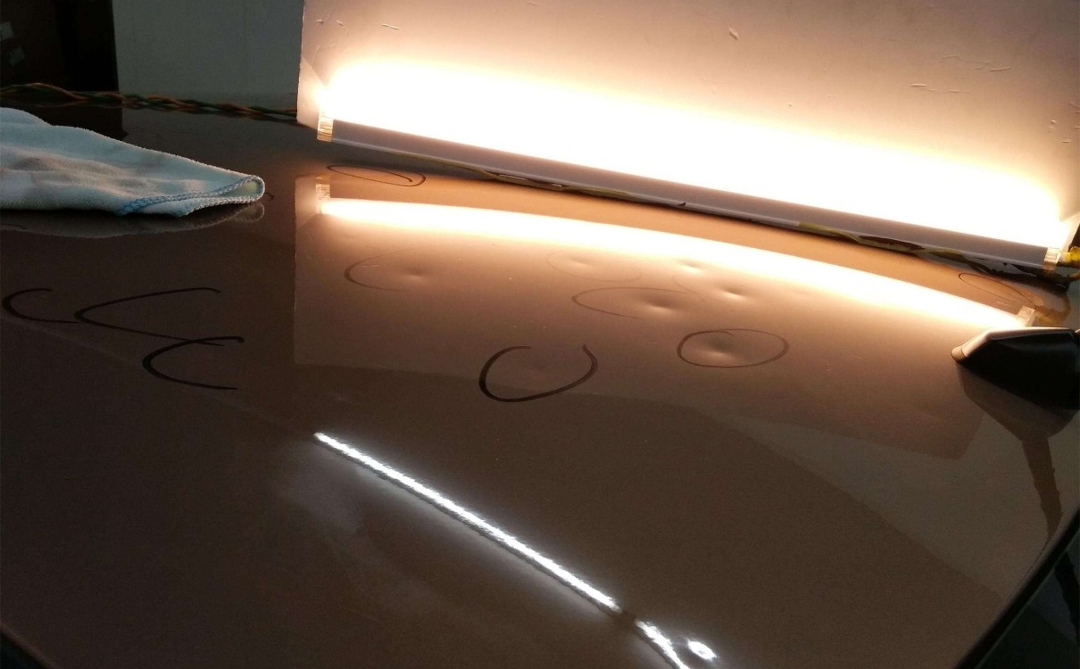 汽车钣金修复与无痕修复价格区别,车身无痕凹坑修复多少钱