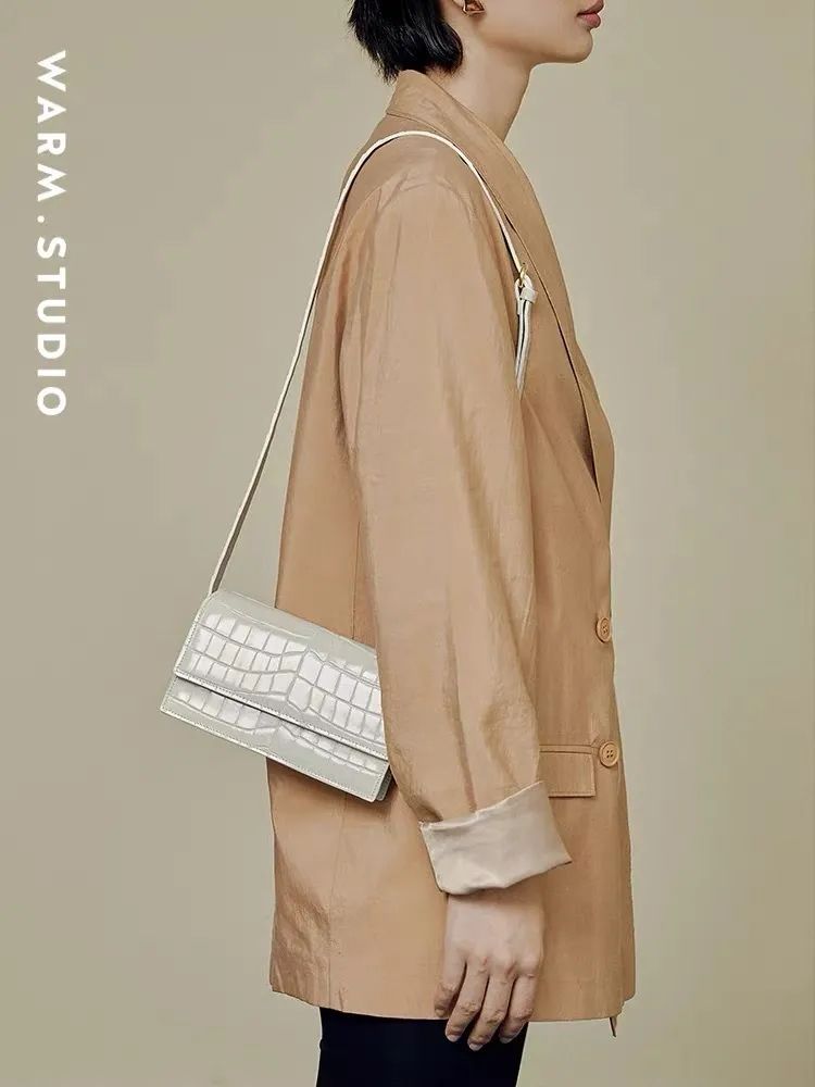 比较实惠的设计师品牌包包,设计师品牌的包包推荐