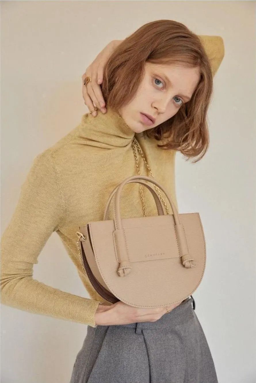 比较实惠的设计师品牌包包,设计师品牌的包包推荐