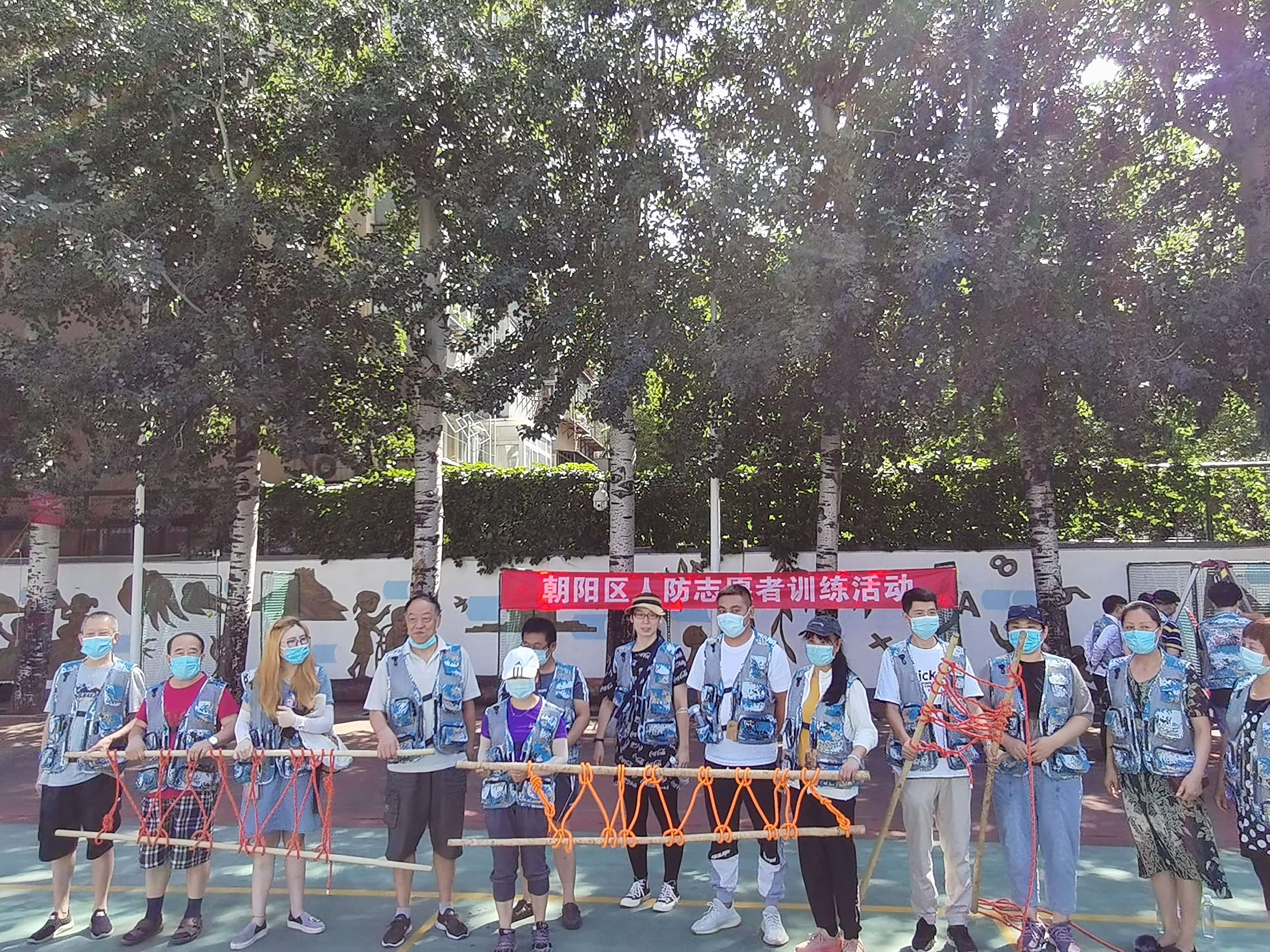 蓝夫执行北京朝阳区人防办与团结湖街道人防志愿者授旗活动