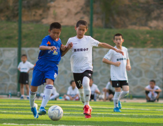 改革开放40年丨玉泉区：实施绿荫计划，校园足球事业长足进步