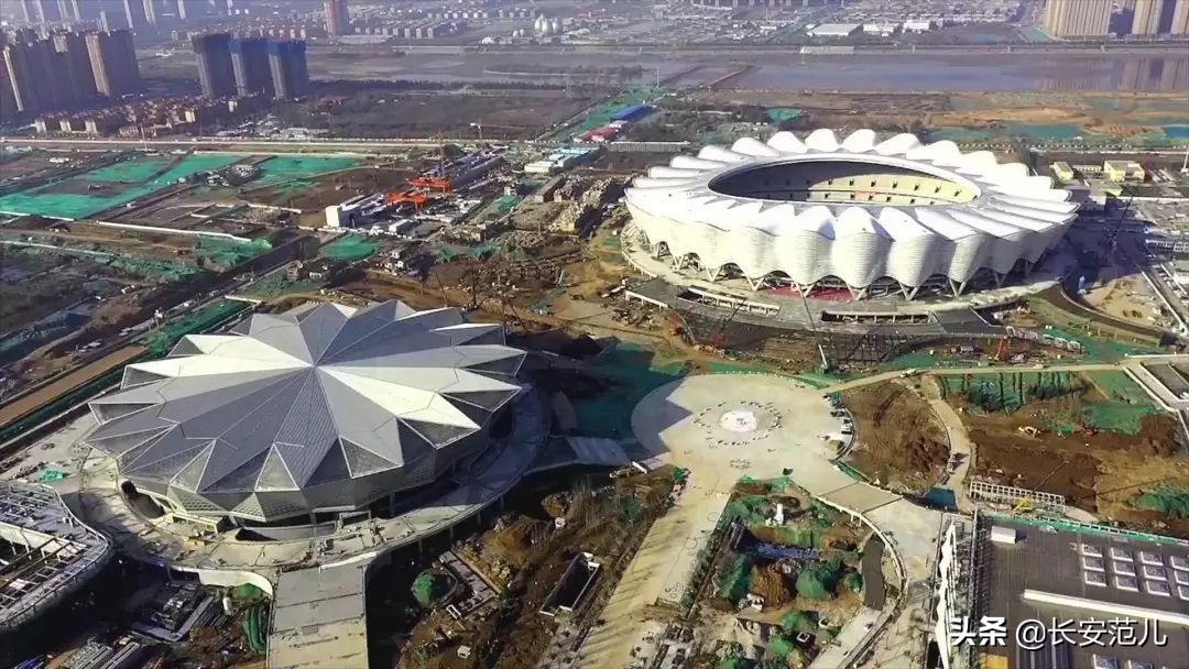 西安最“钢”地标！782天，西安奥体中心主体育场“石榴花”落成