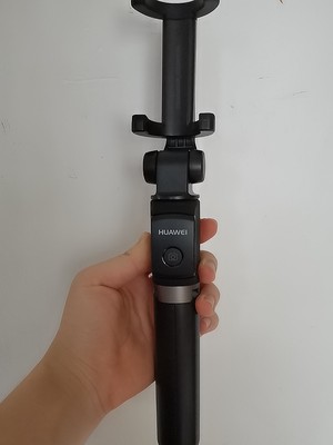 华为三脚架自拍杆af15怎么用,华为有线自拍杆的使用方法及操作