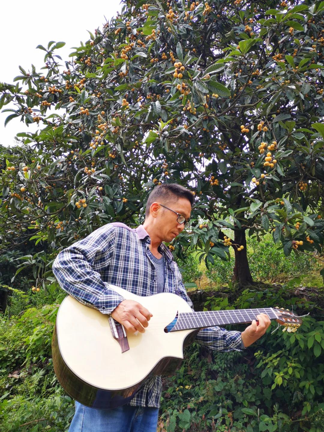 张家界吉他手工制作,张家界手工吉他