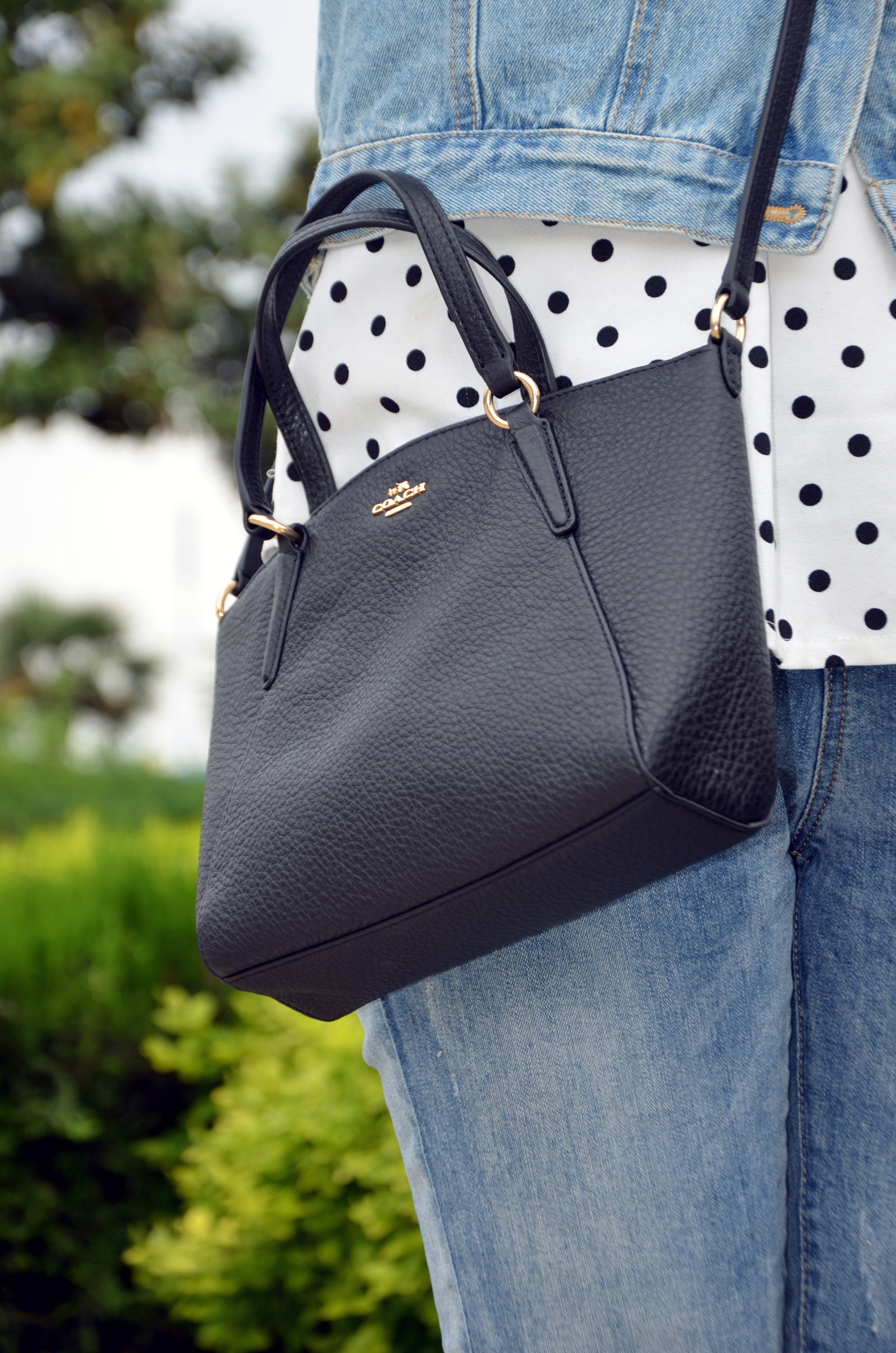 蔻驰coach饺子包,蔻驰女包的包包怎么样