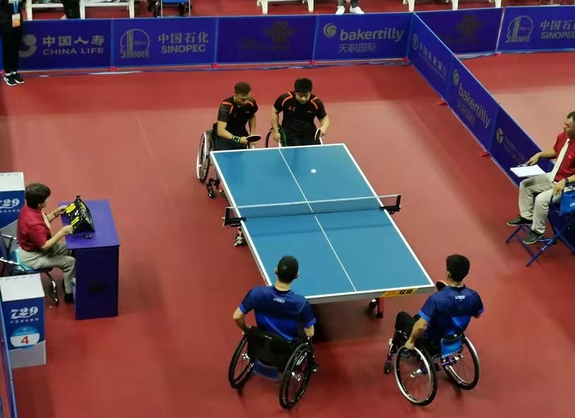 北京轮椅乒乓球“60后”老将高延明赢得全国残运会“全满贯”