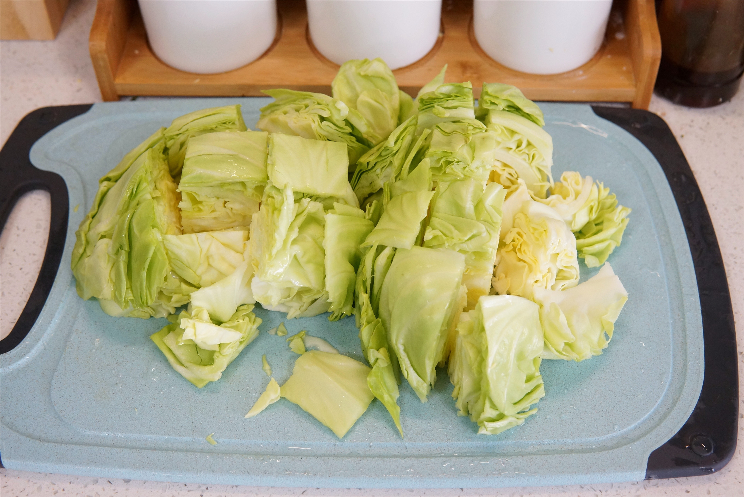 为什么饭店做的包菜这么干,饭店炒包菜感觉很生
