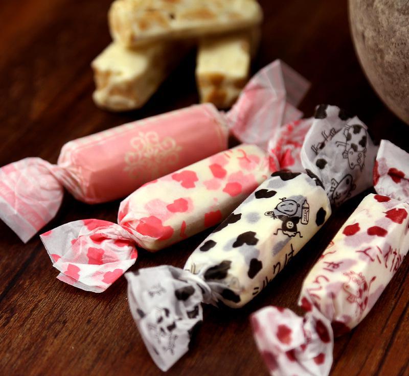 糖果上面入口即化的纸膜是什么,糖果外面粘的糖纸怎么去除