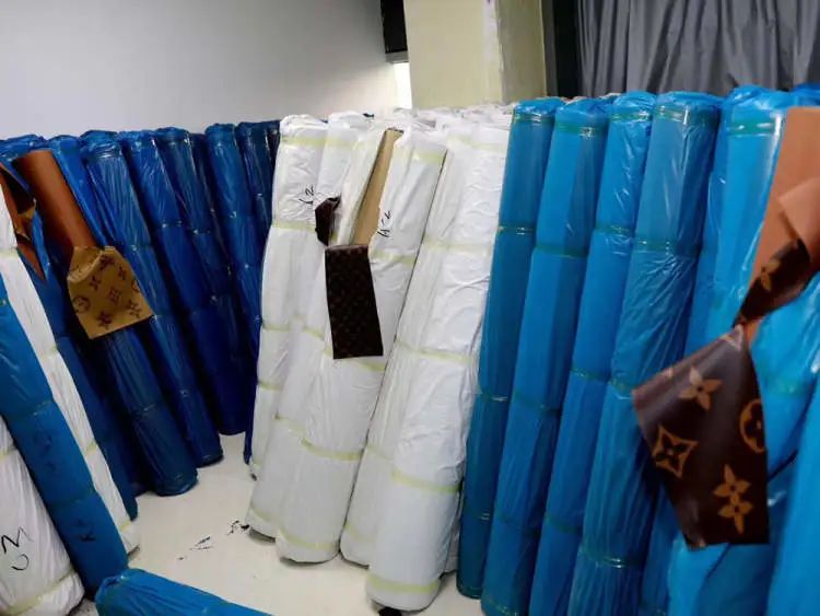 首例假冒lv等箱包原材料案告破,假冒箱包原材料案