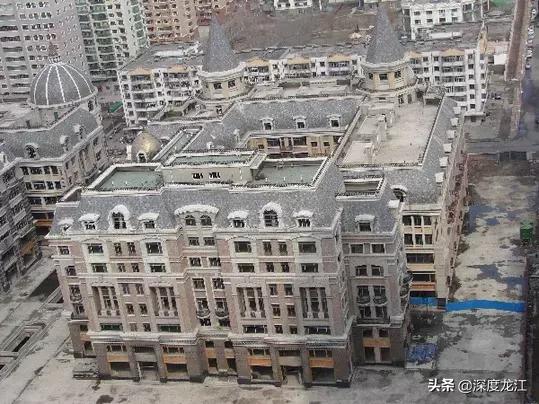 哈尔滨第一大烂尾楼现状,哈尔滨烂尾楼艺华大厦