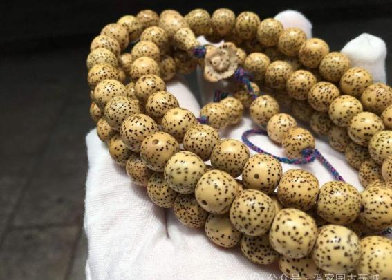 星月菩提黑金玉化籽如何辨别真假,黄金星月菩提真假辨别