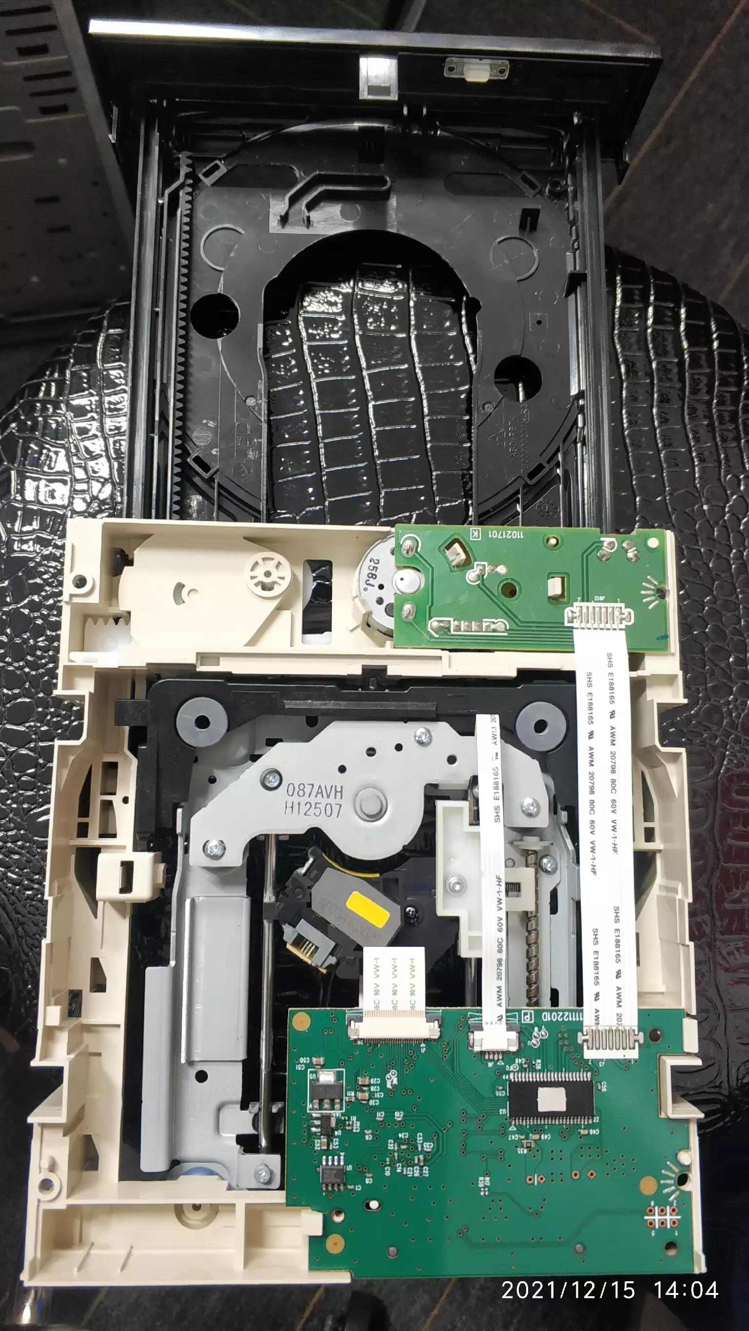 光驱弹出来如何装回去,光驱拆了怎么装