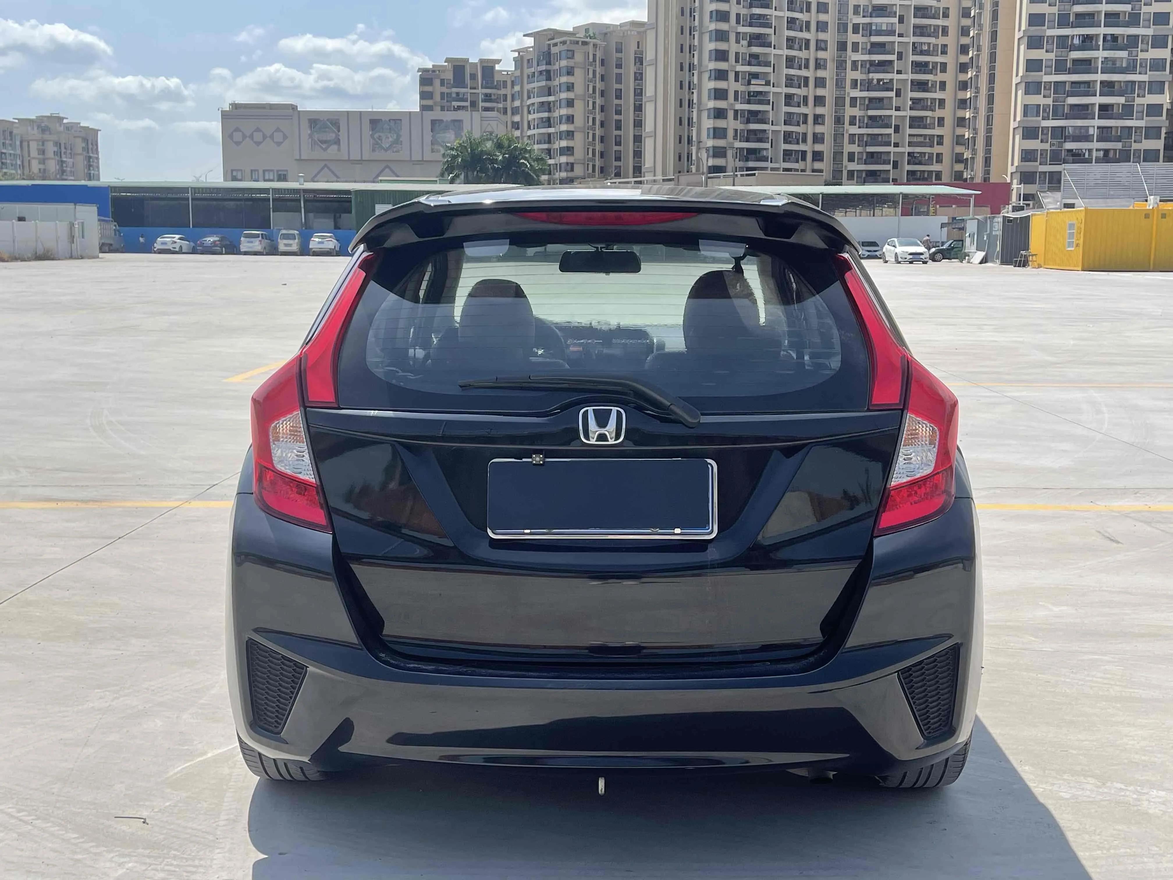 飞度2014款1.5cvtexli领先版价格,本田飞度09款1.3l图片