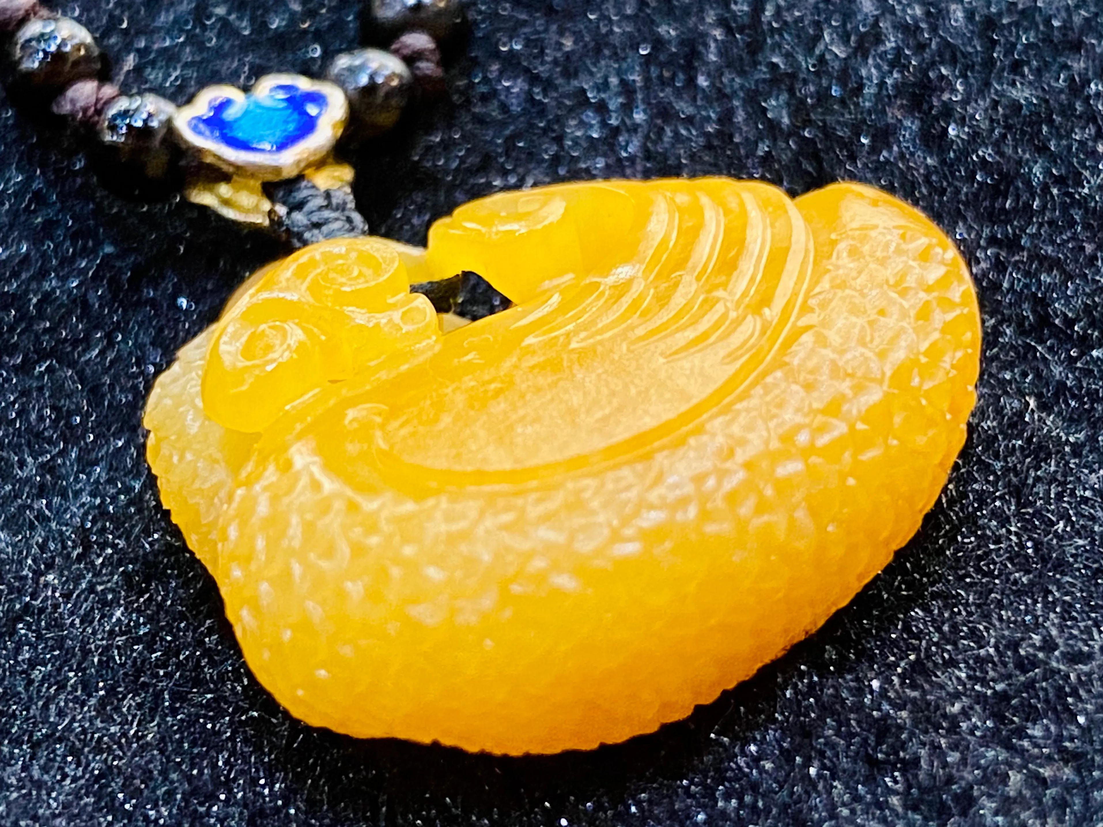 小挂件黄沁籽料,青海料仿黄沁籽料