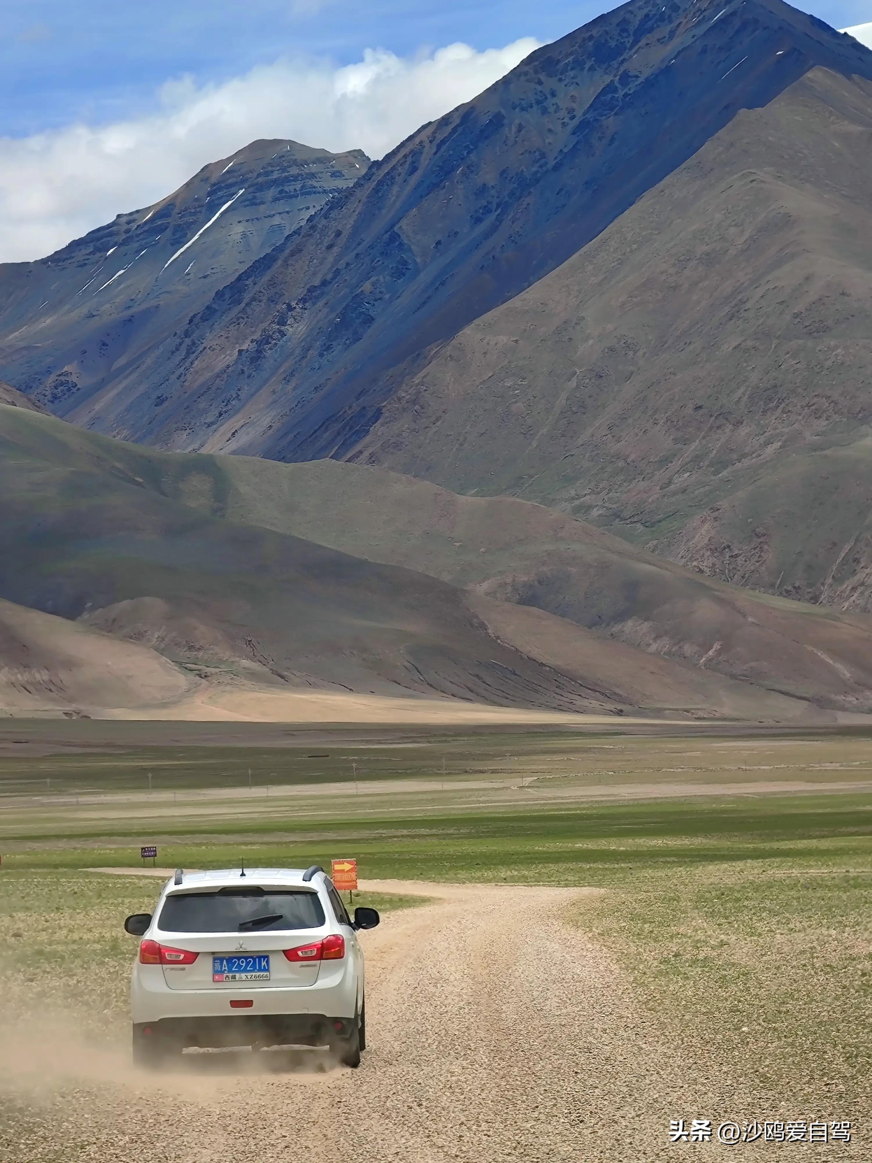 自驾四进*藏西***疆新**第12天:人在囧途:当惹雍措圣湖边陷车,轮胎鼓包