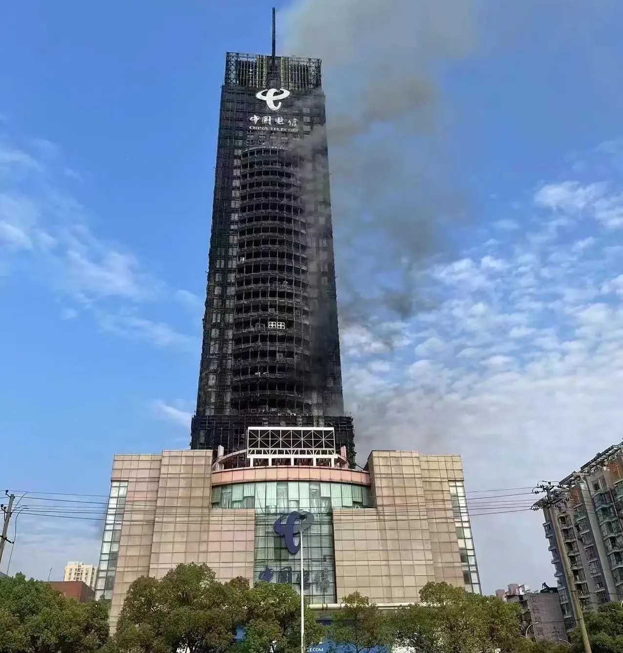 长沙电信楼被烧,长沙电信大楼被烧毁重建要多少钱