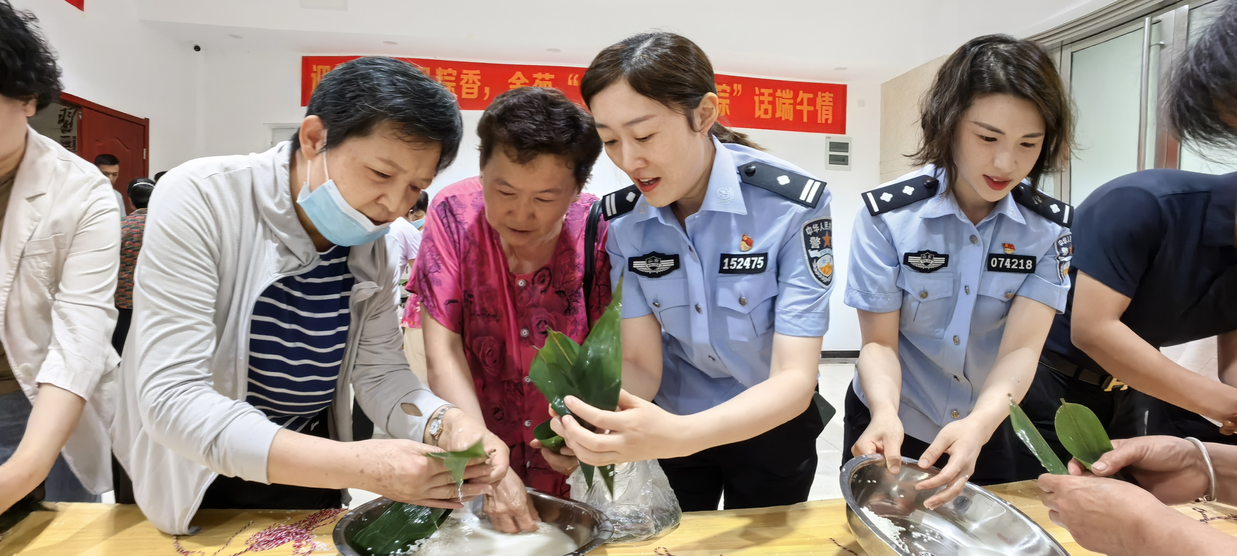 金雀山街道金苑社区：举办“粽叶飘香迎端午、反诈粽子进社区”活动