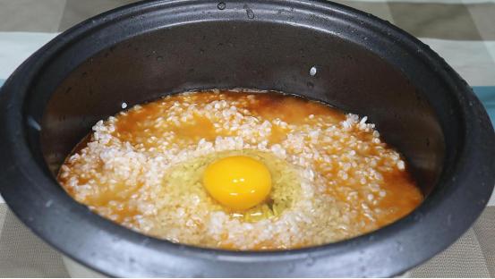 蒸米饭时打一个鸡蛋会怎么样,蒸米饭打入一个鸡蛋