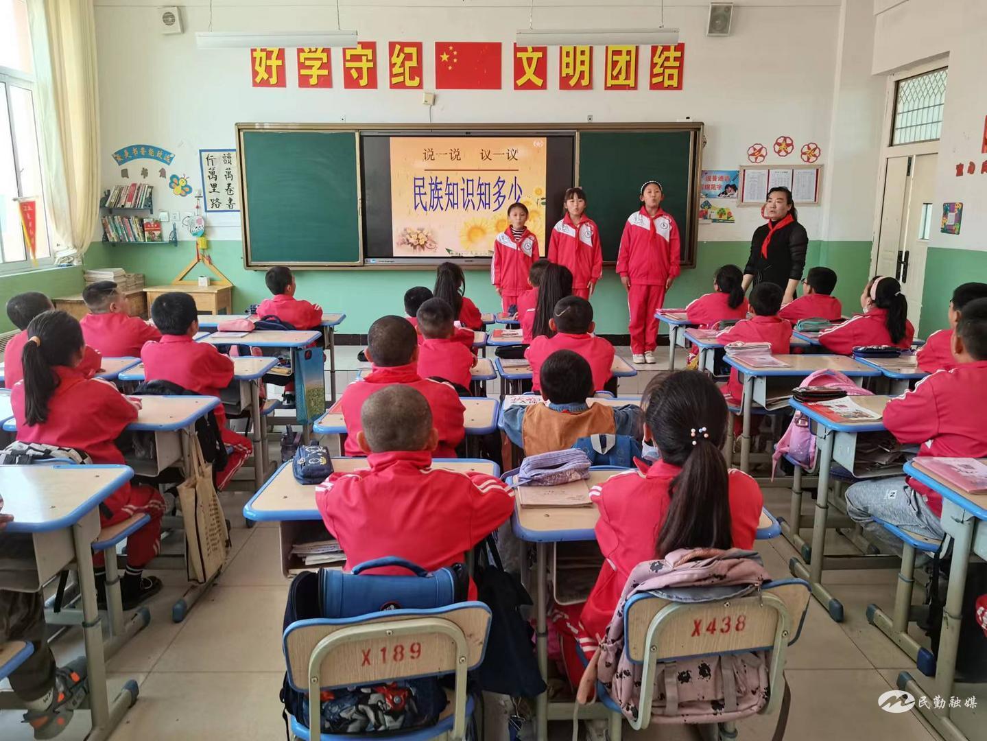 民族团结一家亲石榴花开,民族团结一家亲小学活动