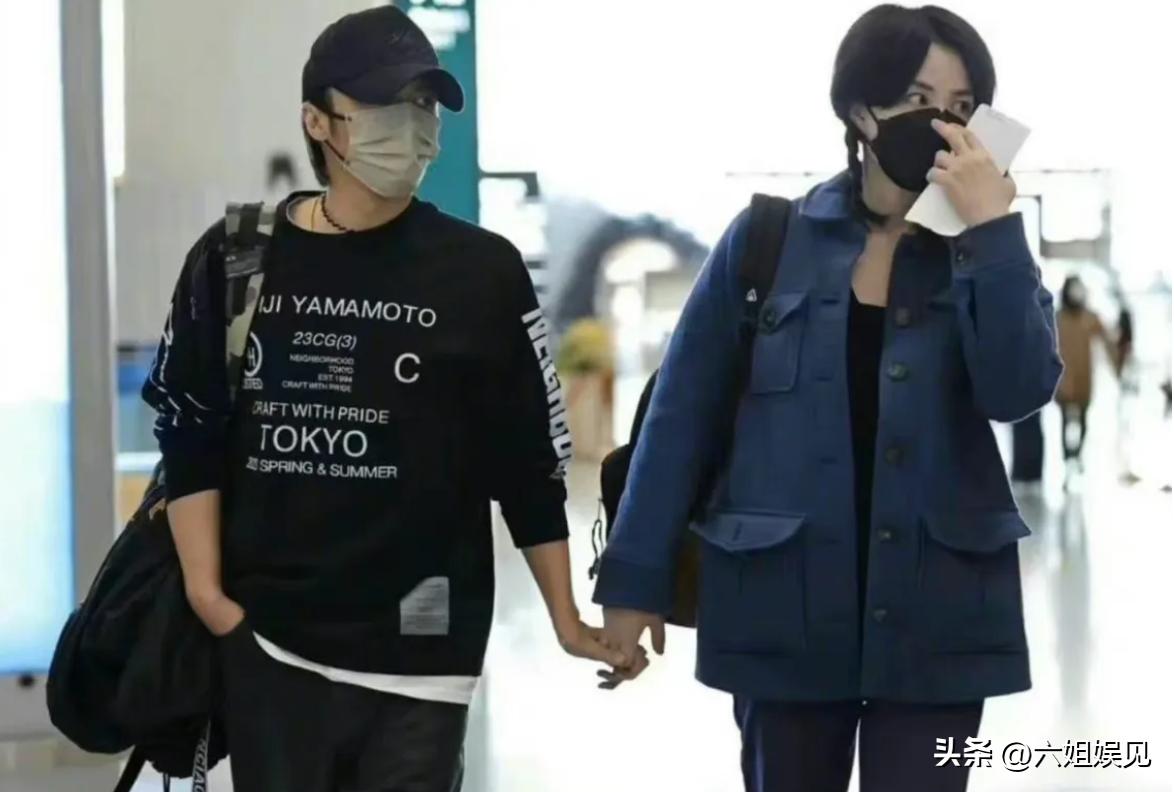 王菲谢霆锋机场牵手登上热搜采访,王菲谢霆锋高调牵手视频